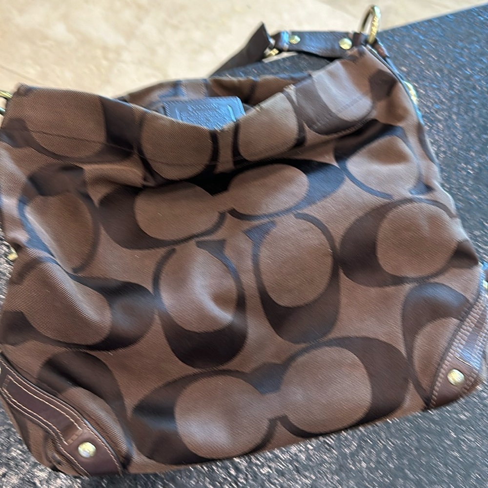 Coach Dark brown canvas.